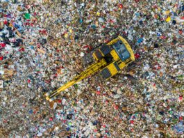 Microplastics, waste bottles, plastic bottle waste being shown from aerial view