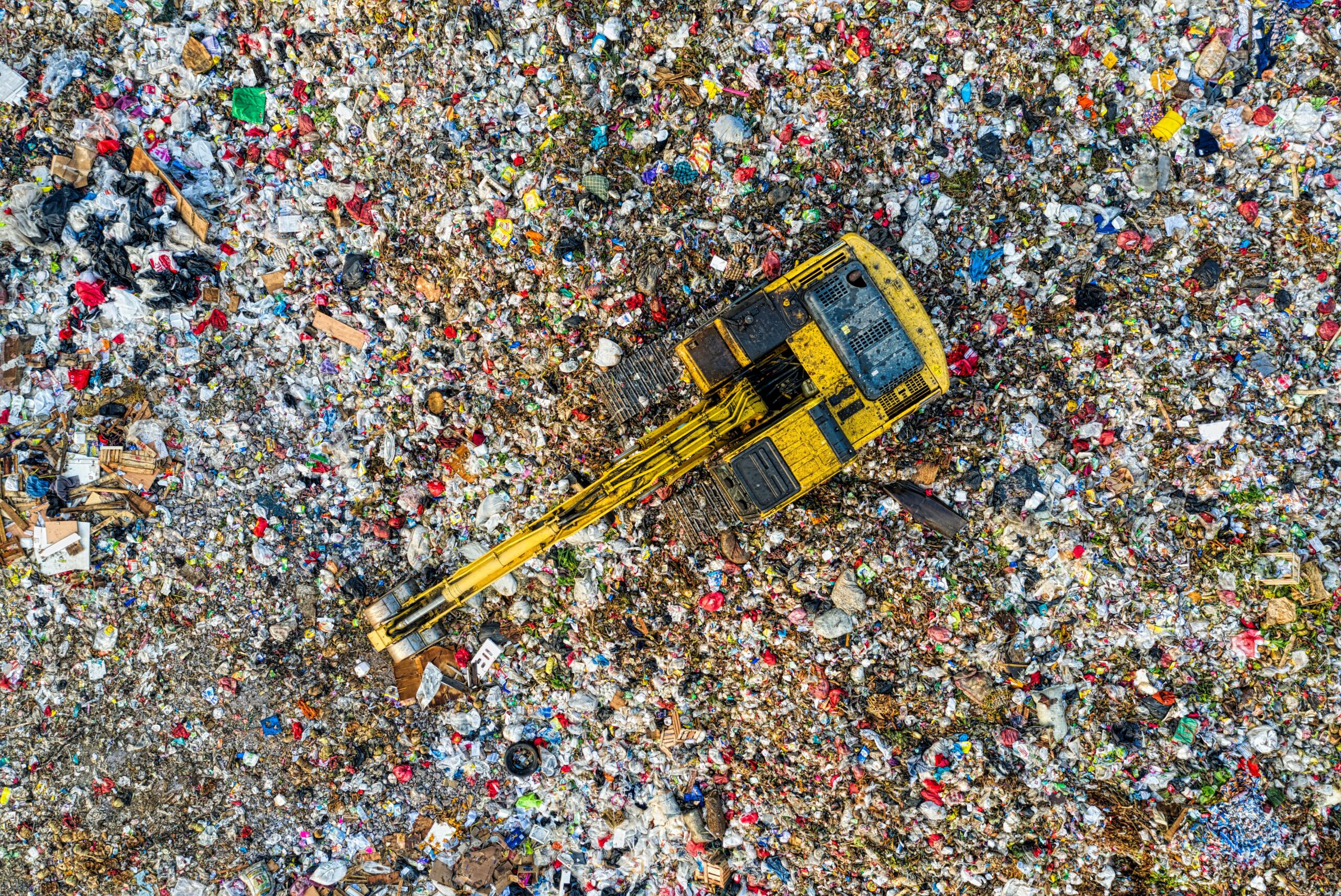 Microplastics, waste bottles, plastic bottle waste being shown from aerial view