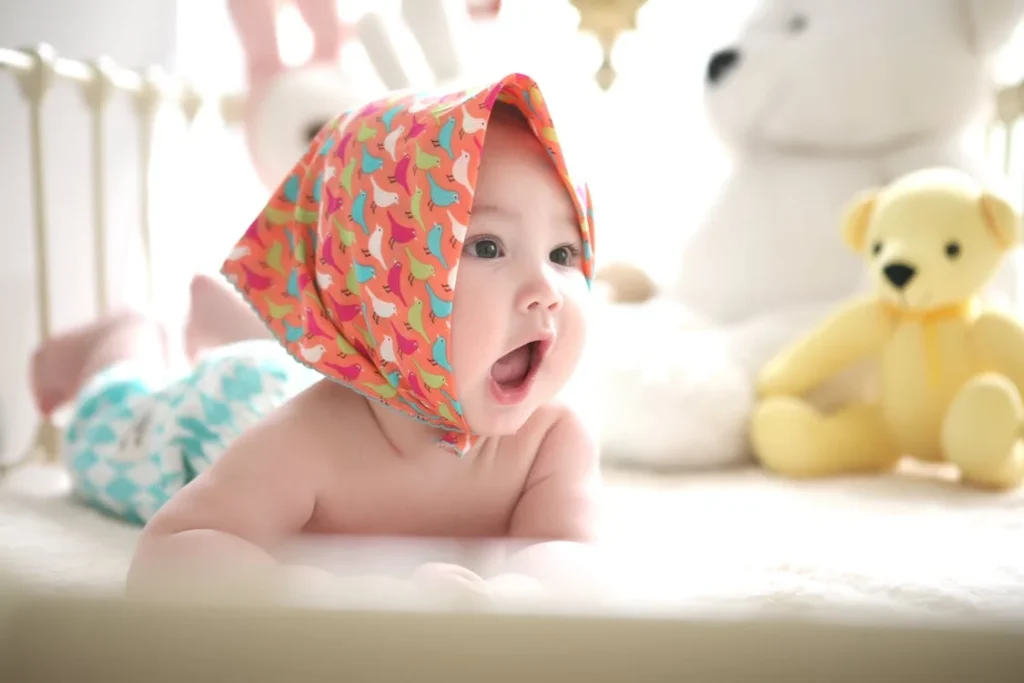 Toddler Wearing Head Scarf in Bed // Healthier Baby Today