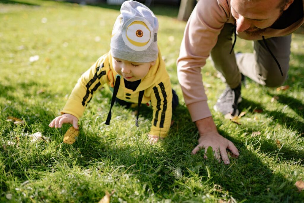 A Kid Crawling on the Grass // Healthier Baby Today
