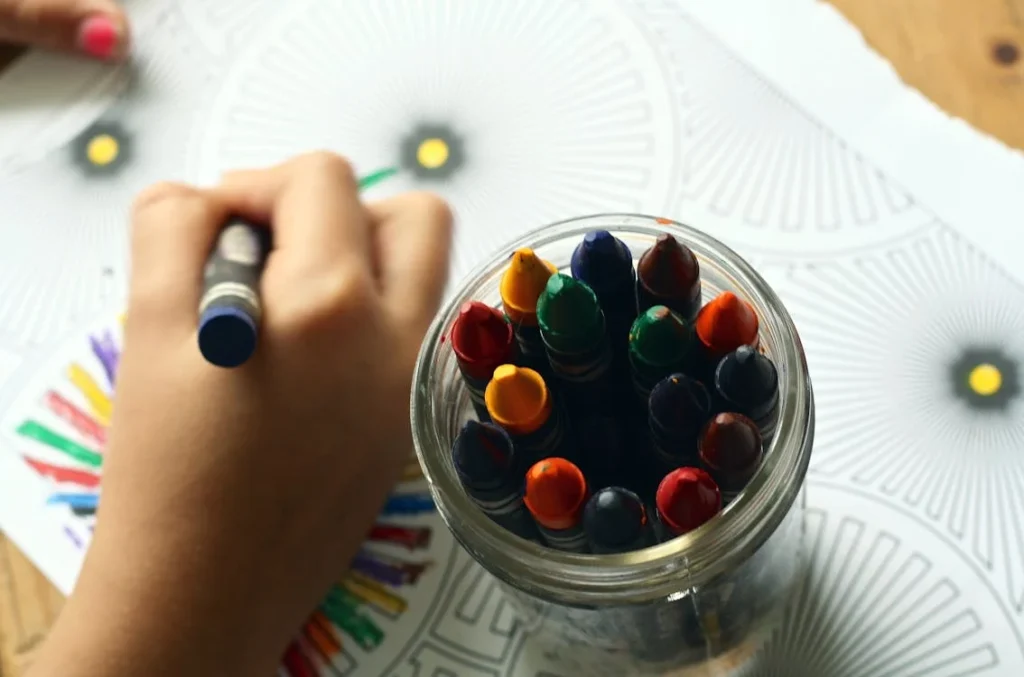 Person Coloring Art With Crayons // Healthier Baby Today