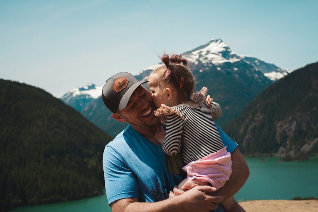 too young to be dad, A Little Girl Giving her Dad a Kiss // Healthier Baby Today
