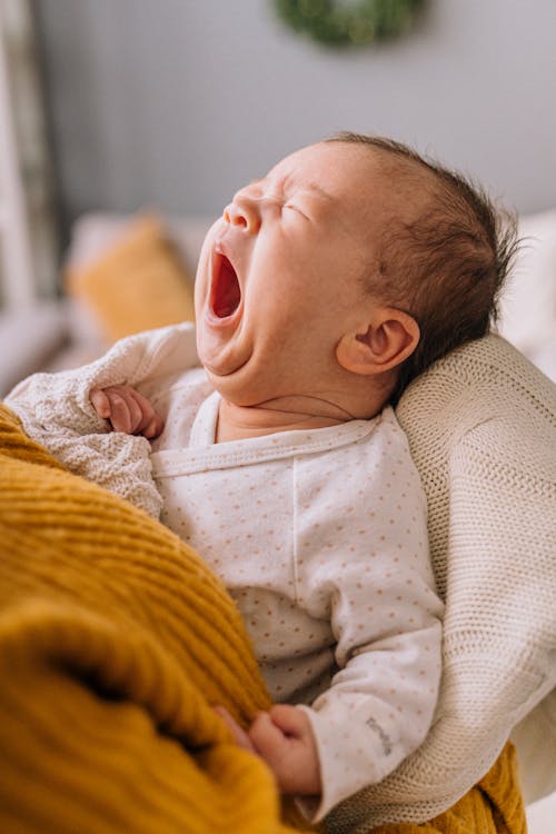Baby in a Blanket Yawning // Healthier Baby Today
