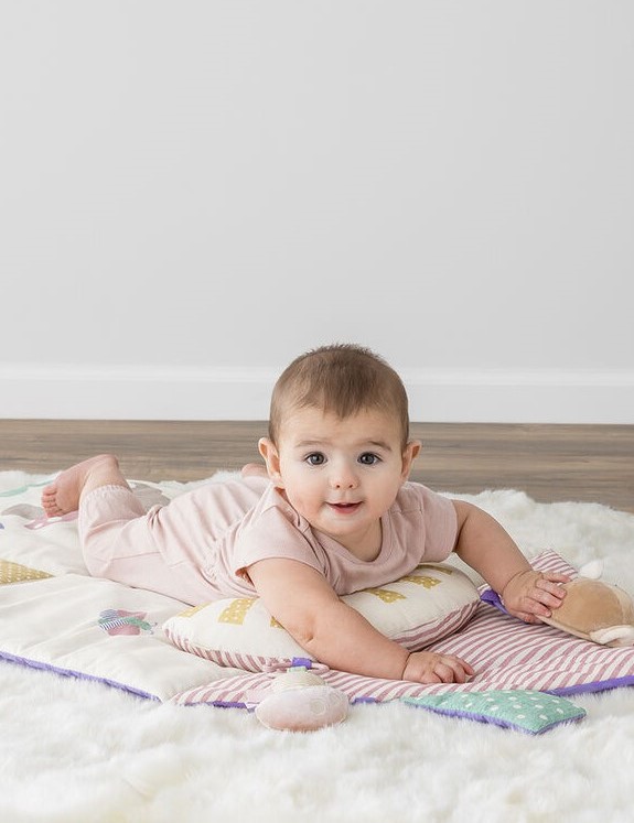 Baby on tummy time mats // Healthier Baby Today