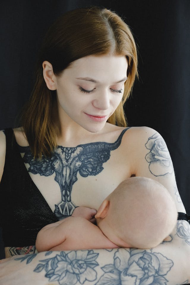 Mother Breastfeeding her Child // Healthier Baby Today