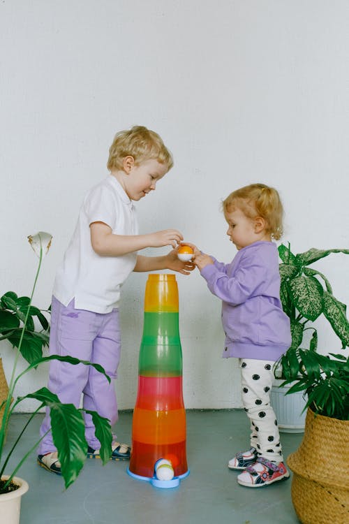 Siblings Sharing With Their Toys, how to teach my four year old to share // Healthier Baby Today