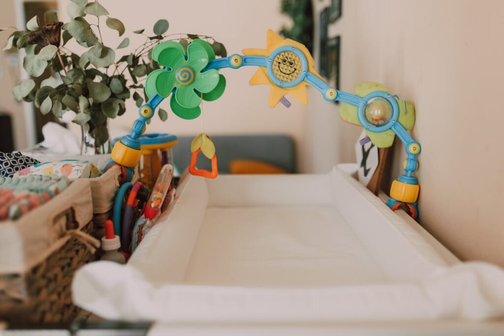 A Baby Bed With Toys Decoration // Healthier Baby Today