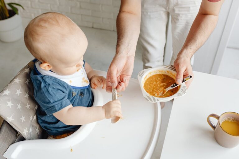 Baby Food Recipes, A Boy Holding a Spoon // Healthier Baby Today