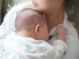 A Newborn Baby Lying on Her Mother's Chest // Healthier Baby Today