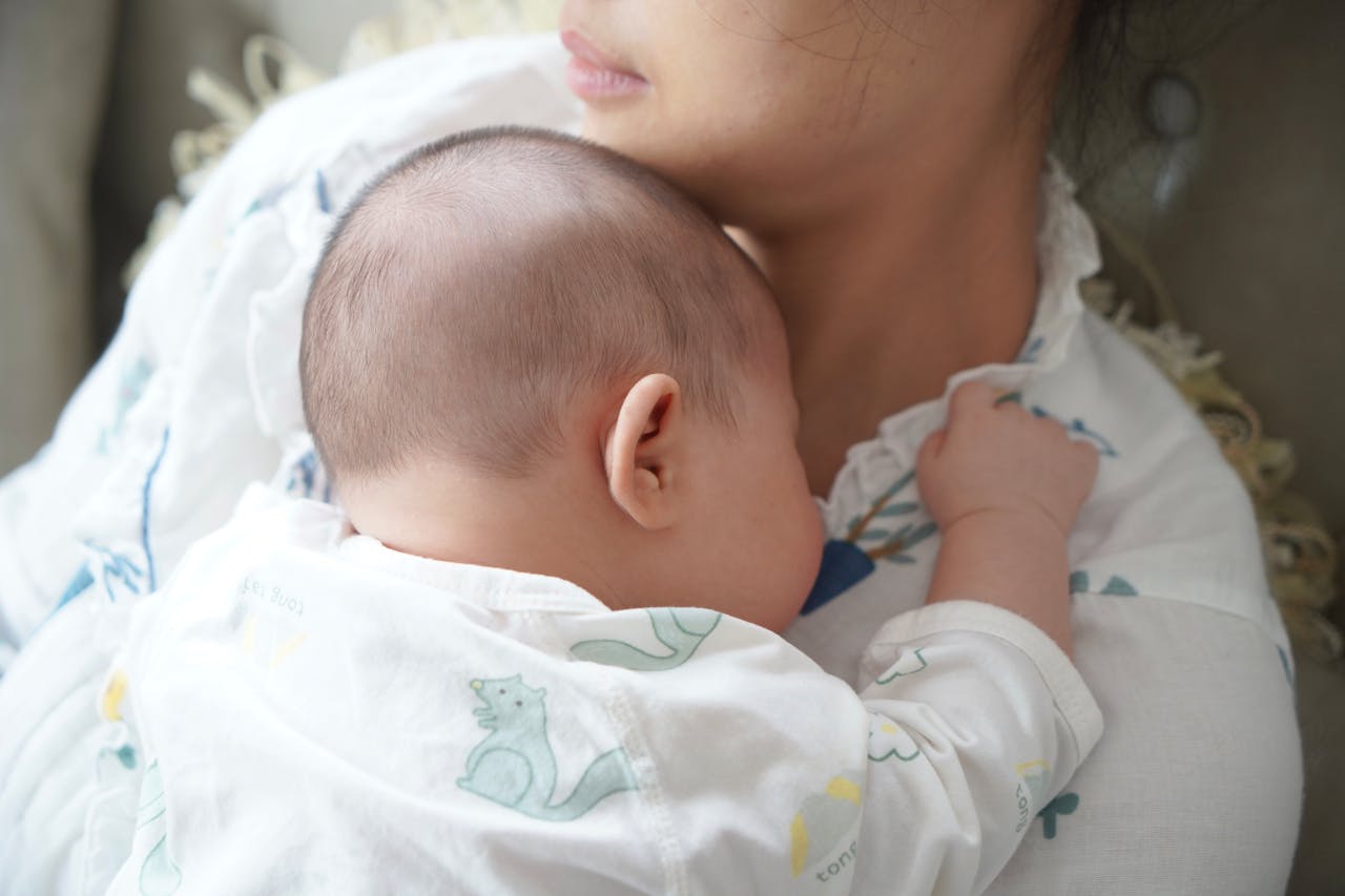 A Newborn Baby Lying on Her Mother's Chest // Healthier Baby Today
