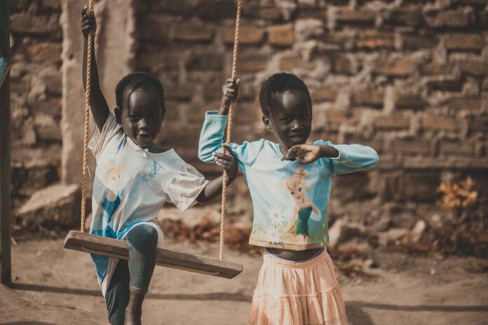 Indoor Swing, Kids Wearing Blue Shirt // Healthier Baby Today