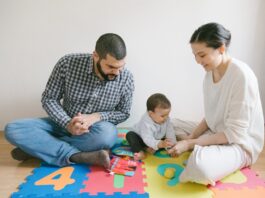 Family Playing on the Puzzle Mat // Healthier Baby Today