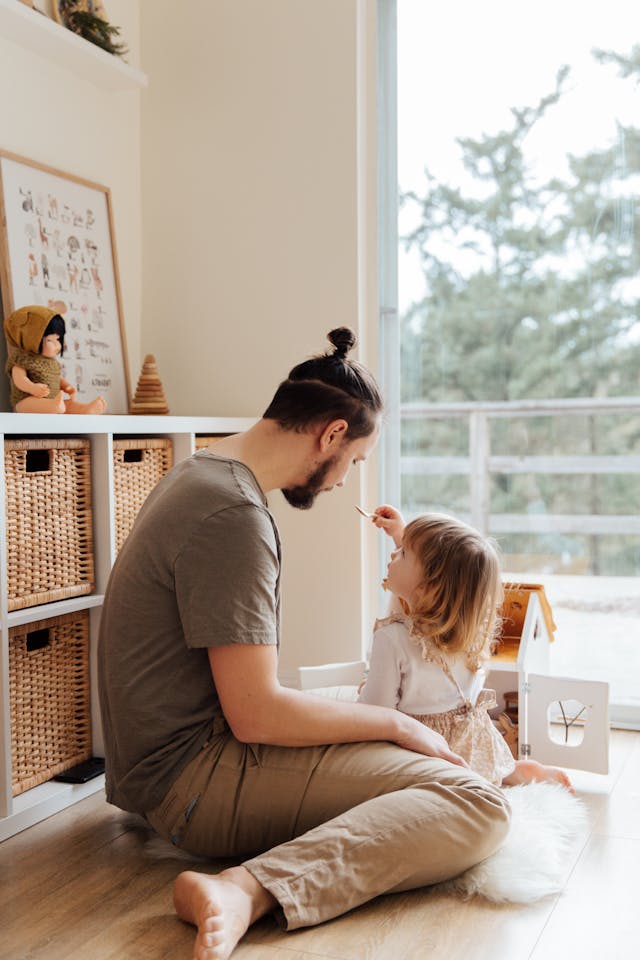 Photo Of Man Playing With Child // Healthier Baby Today