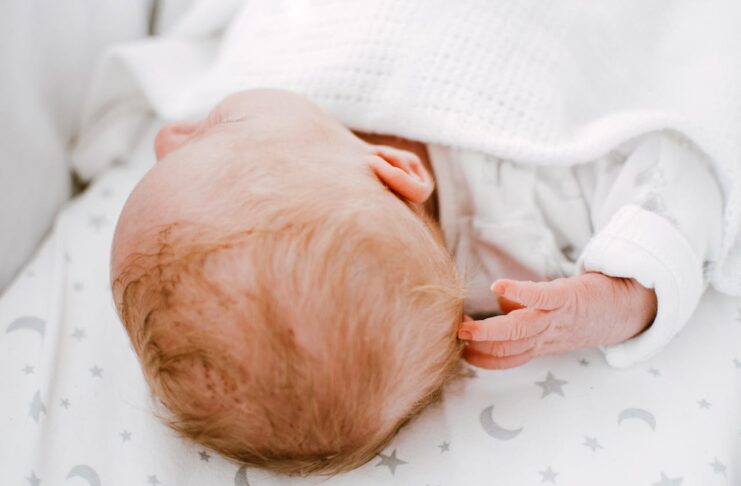 Photo of Baby Lying Down, Haircut for Newborns // Healthier Baby Today