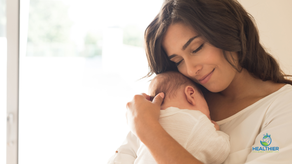 Mom holding her baby // Healthier Baby Today