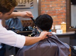 Barber Cutting Client Hair in Salon // Healthier Baby Today