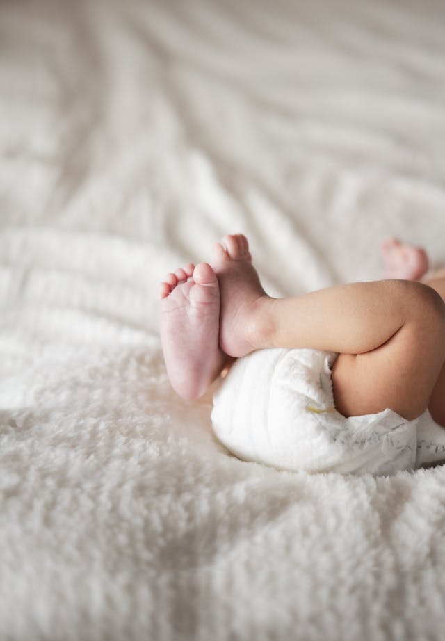 Close-up of a Newborn Baby Lying on a Soft Blanket // Healthier Baby Today