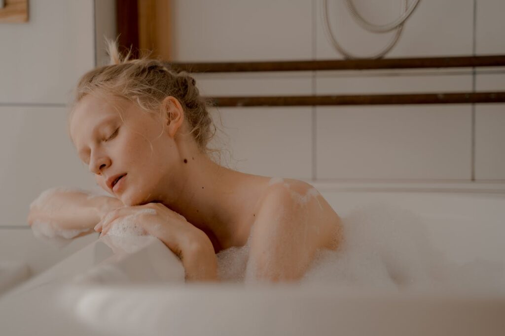 Woman with Closed Eyes in Bathtub // Healthier Baby Today