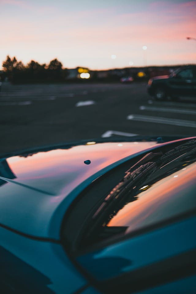 Hood of a Parked Blue Car // Healthier Baby Today