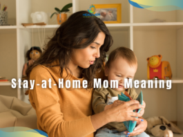 Stay-at-home mom meaning feature, mom is sitting with her toddler on her lap in the playroom // Healthier Baby Today