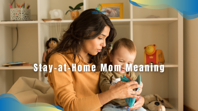 Stay-at-home mom meaning feature, mom is sitting with her toddler on her lap in the playroom // Healthier Baby Today